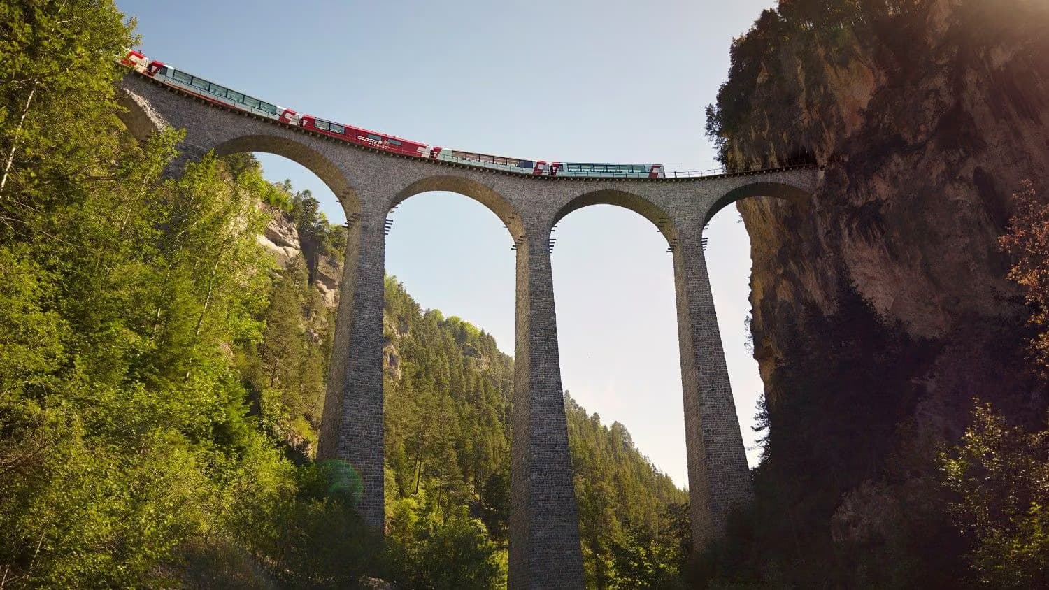 The Glacier Express crossing the dramatic 65-meter-high Landwasser Viaduct on the Rhaetian Railway