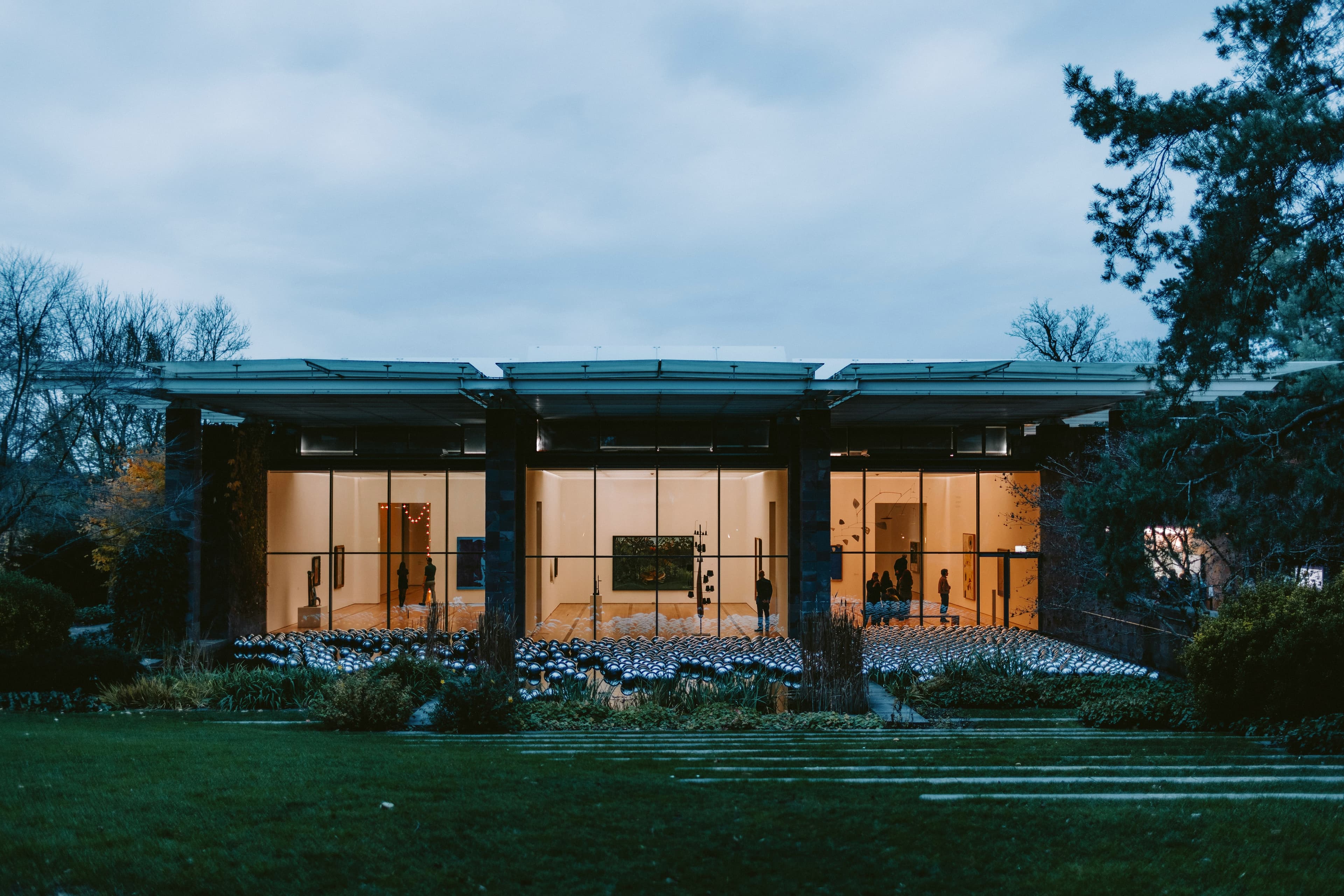 Modern building with large glass windows at dusk in Basel