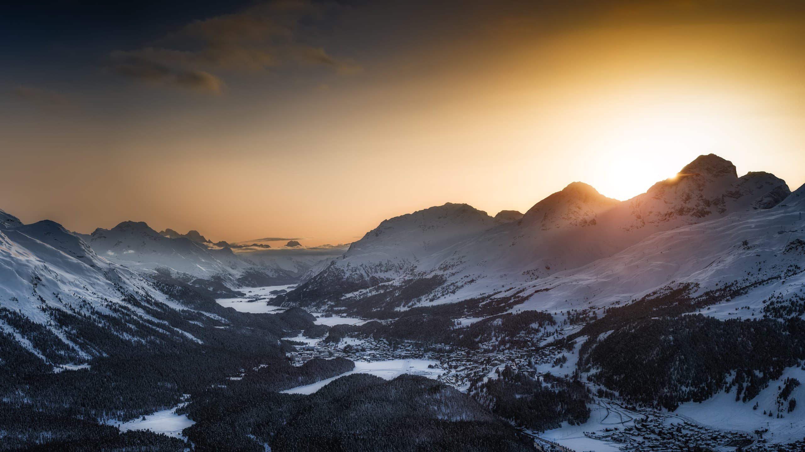 Snow-covered Engadin valley at sunset, viewed from Muottas Muragl