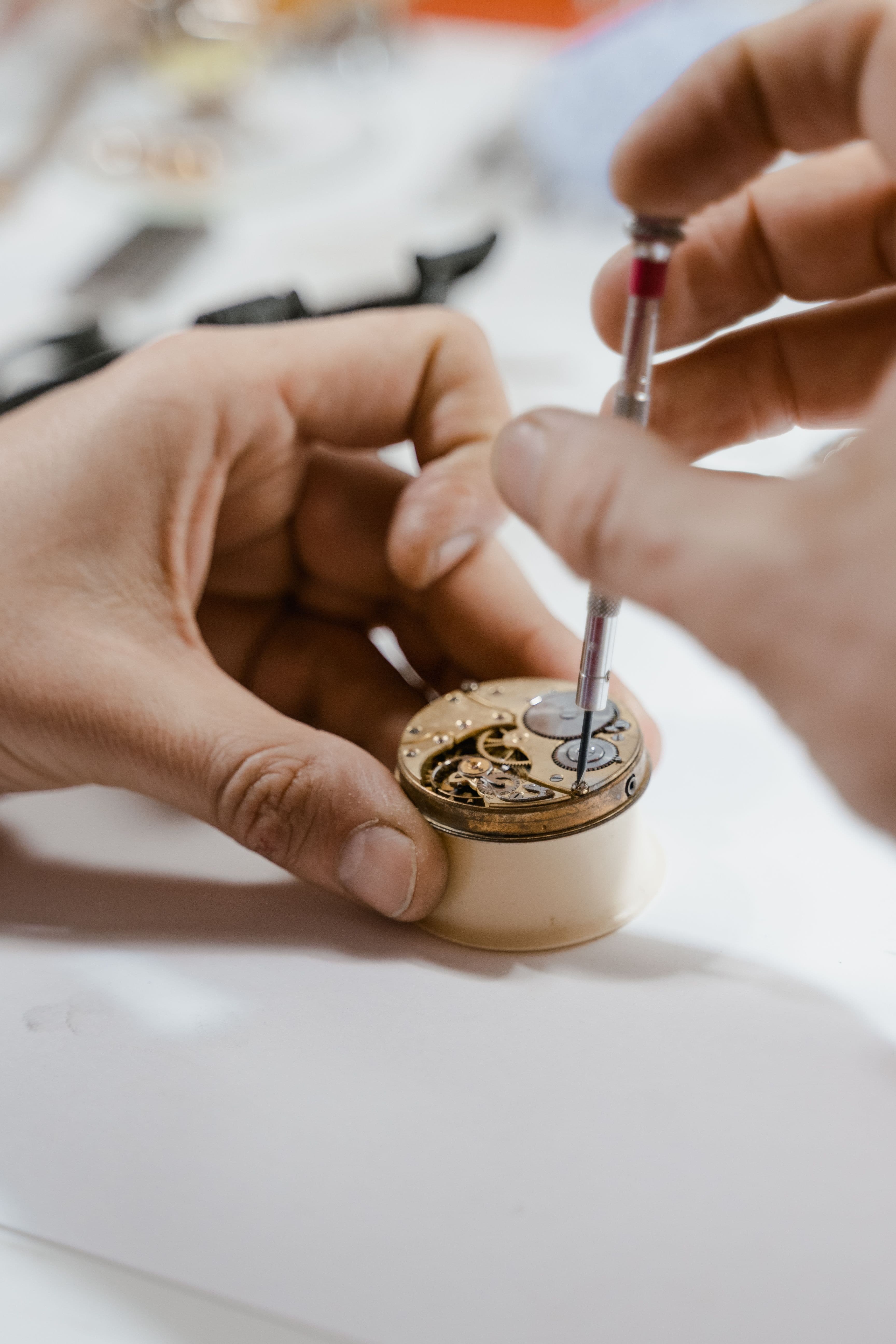 Traditional watchmaking storefront at Atelier Akrivia in Geneva